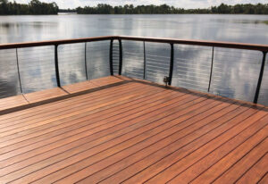 ipe hardwood deck with railing on a waterfront