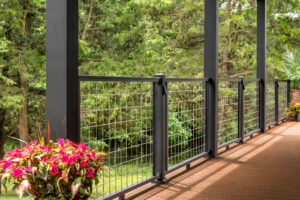 Timbertech decking and railing with a wooded background