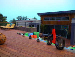 modern redwood deck with colorful decor