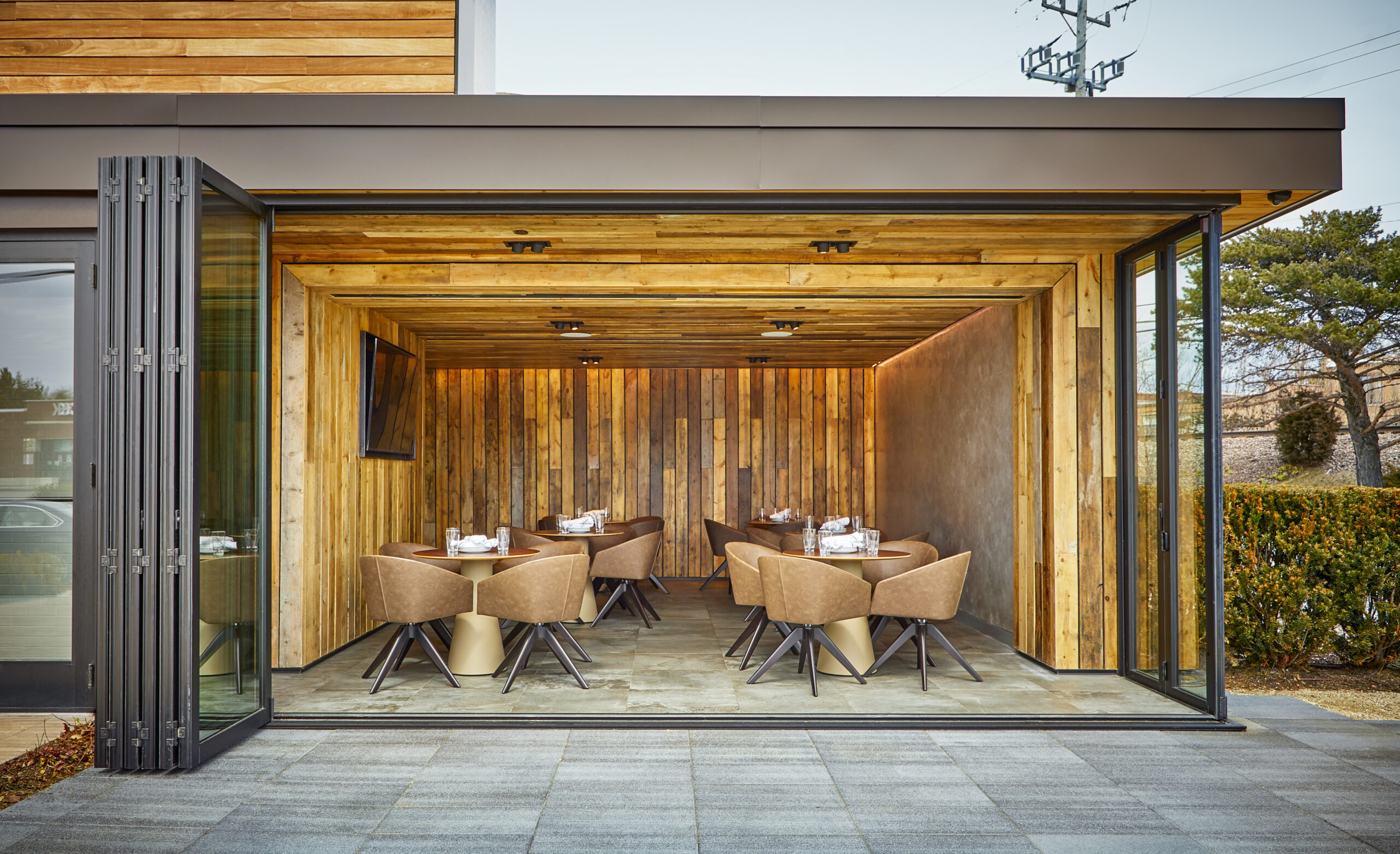 03 Greenwood_Exterior_East dining_Open doors